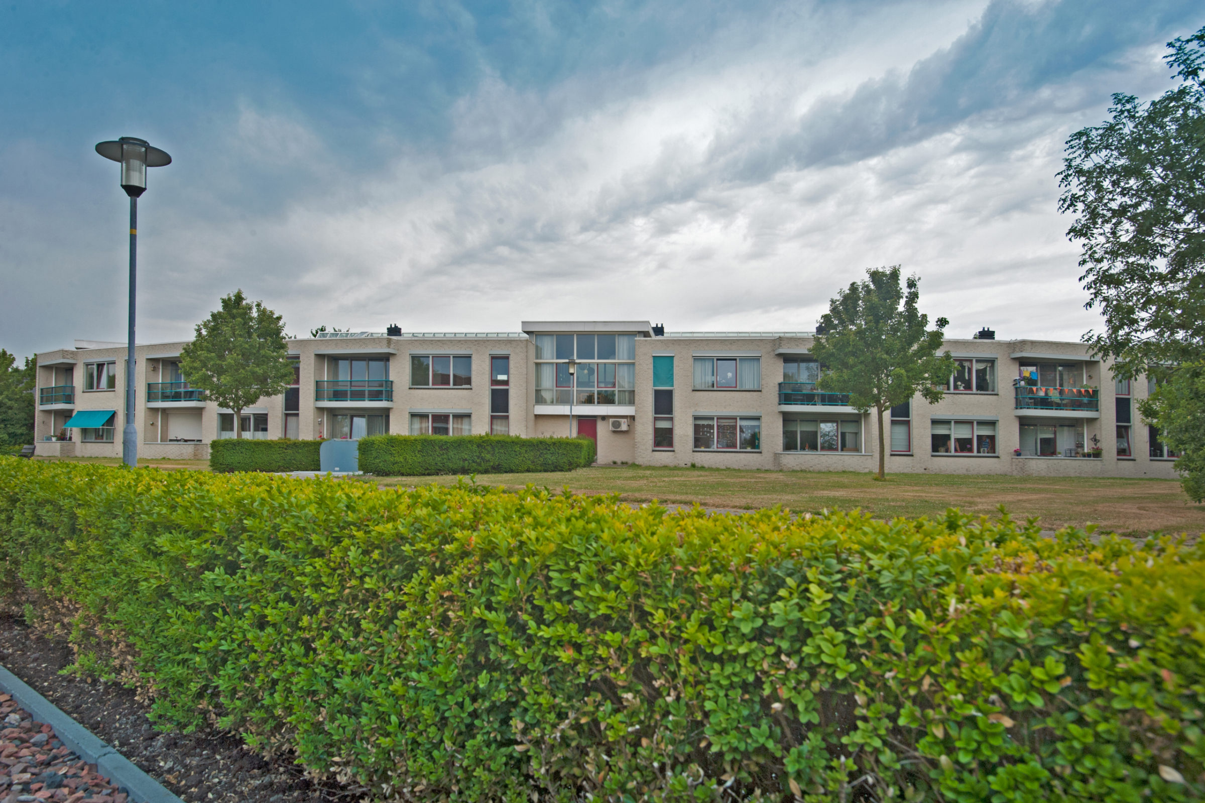 Op deze foto staat een foto van de voorkant van zorgcentrum De Tienden